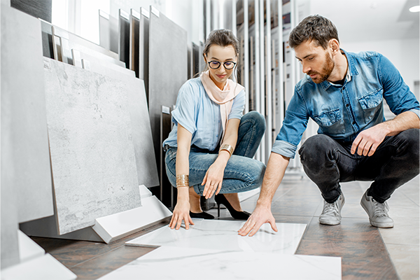 Couple choosing floor tiles
