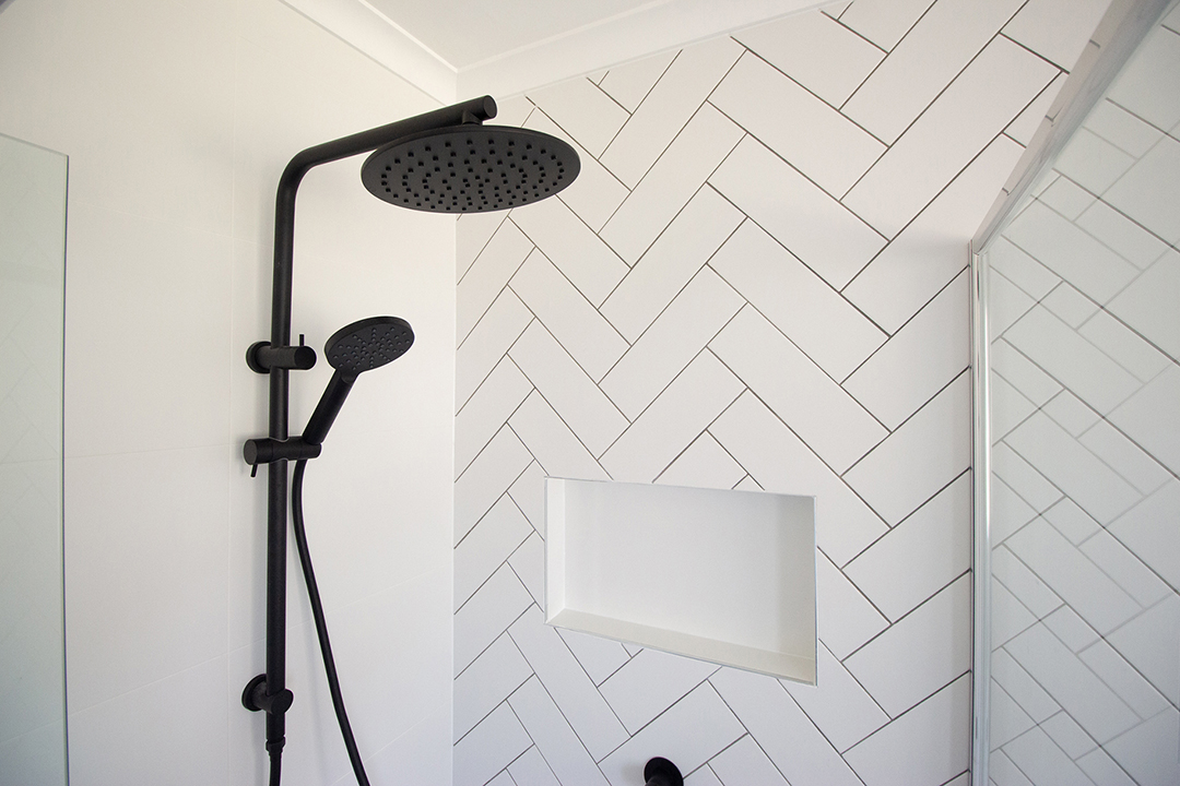 IMG_5626-1080 White tile bathroom with black shower head