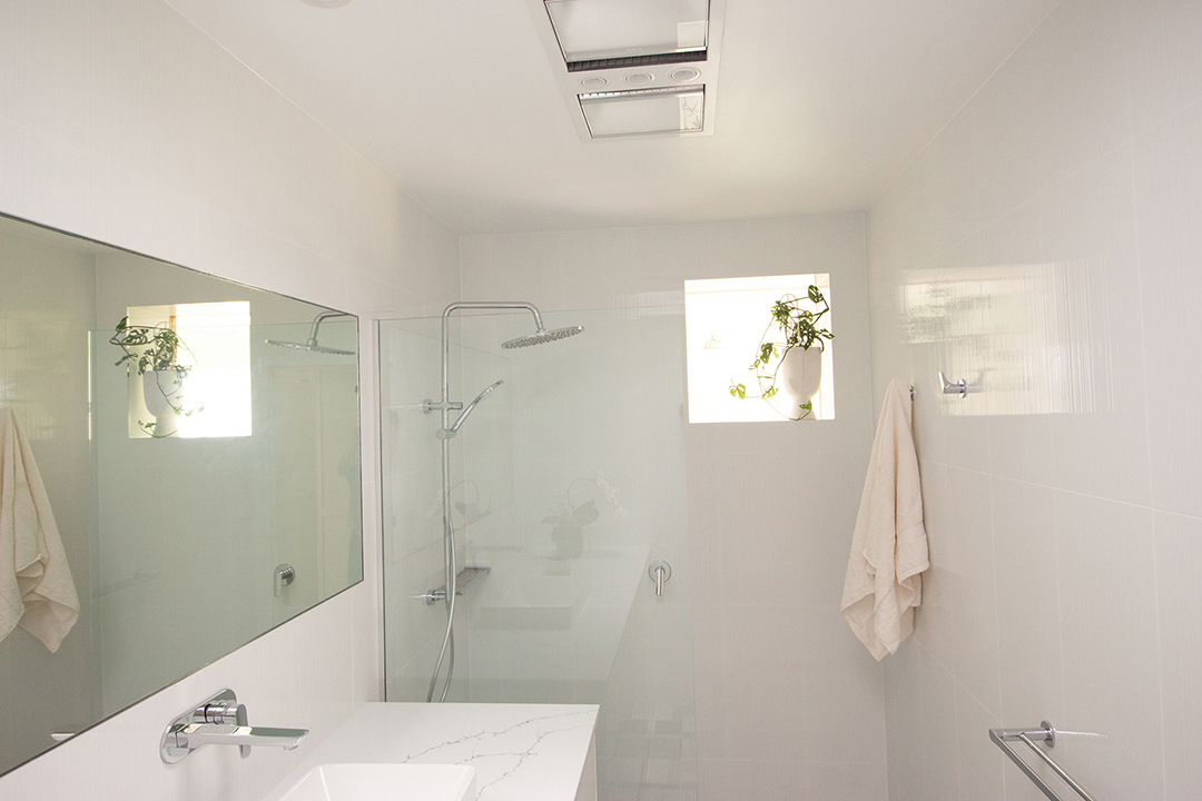 IMG_5706-1080 White tile bathroom with marble countertop