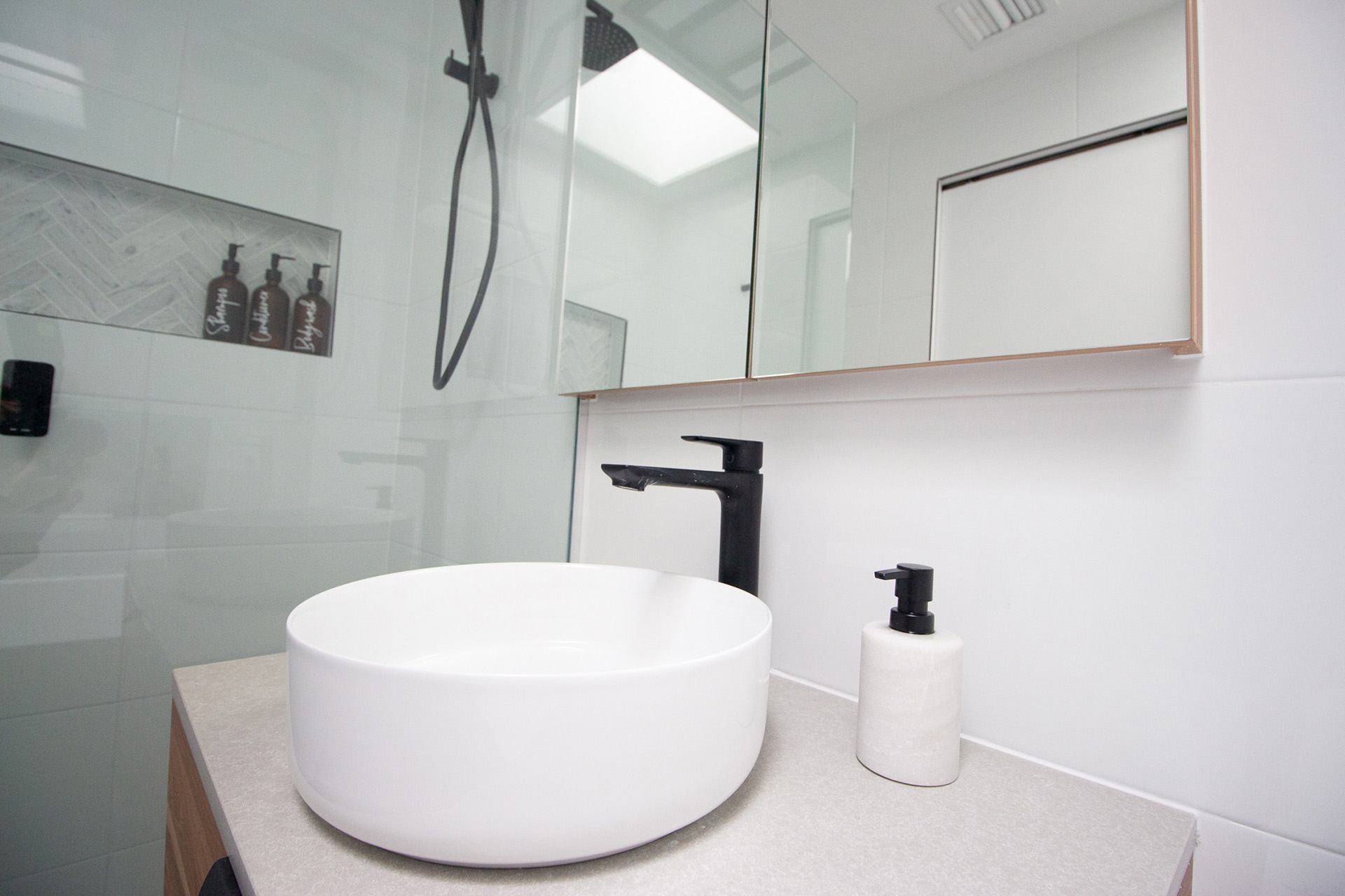 IMG_5925-reduced White tile bathroom with stone counter sink