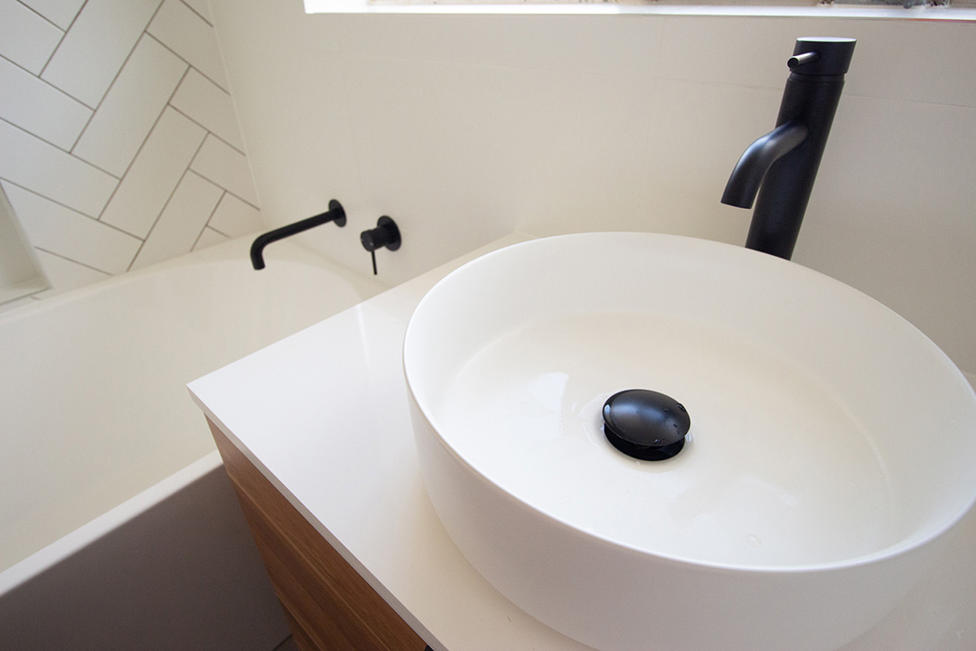 IMG_5621-1080 White bathroom with black faucets and taps